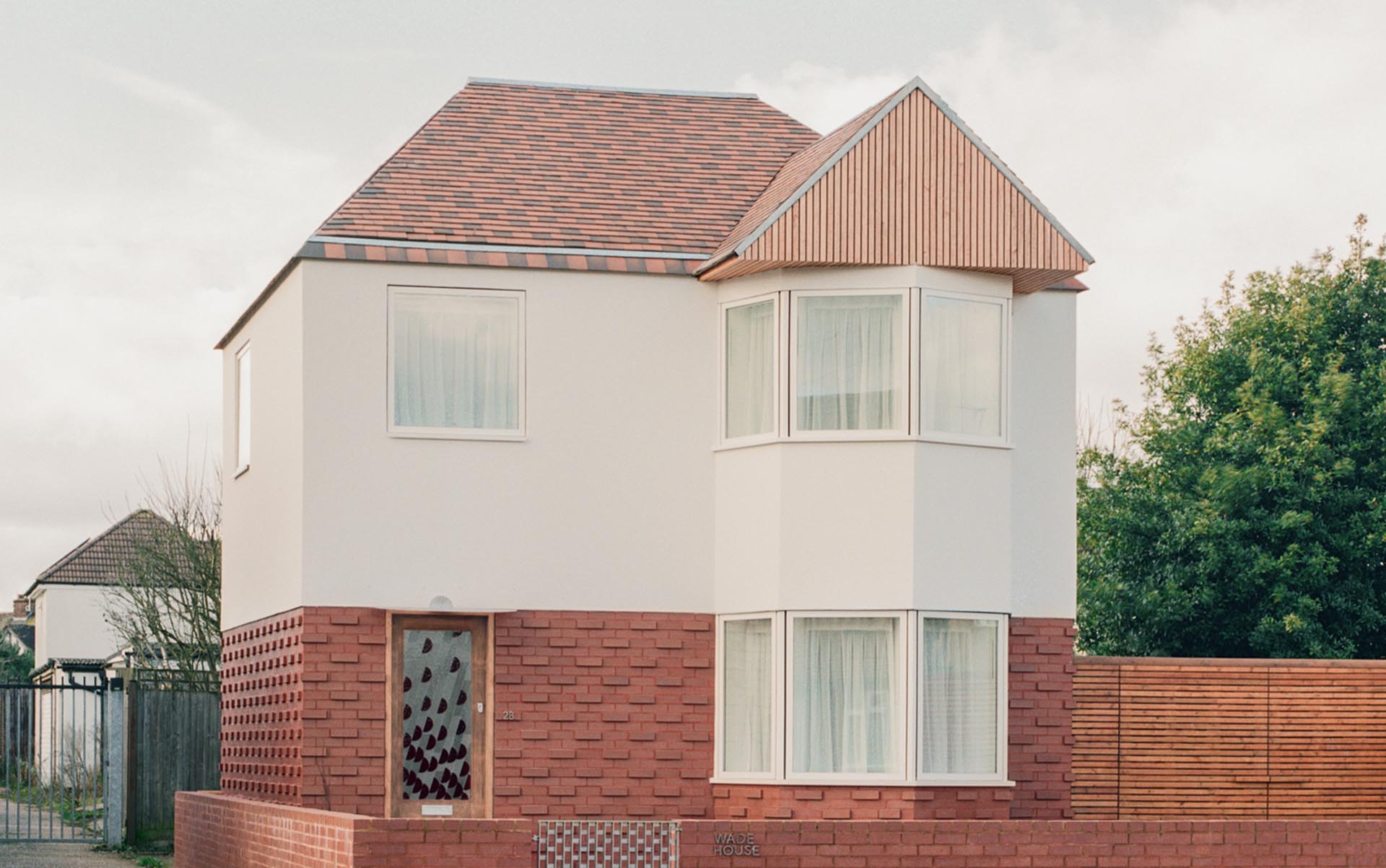 Country brown and brown brindle tiles at Wade House by Wadhal Architects Lorenzo Zandri
